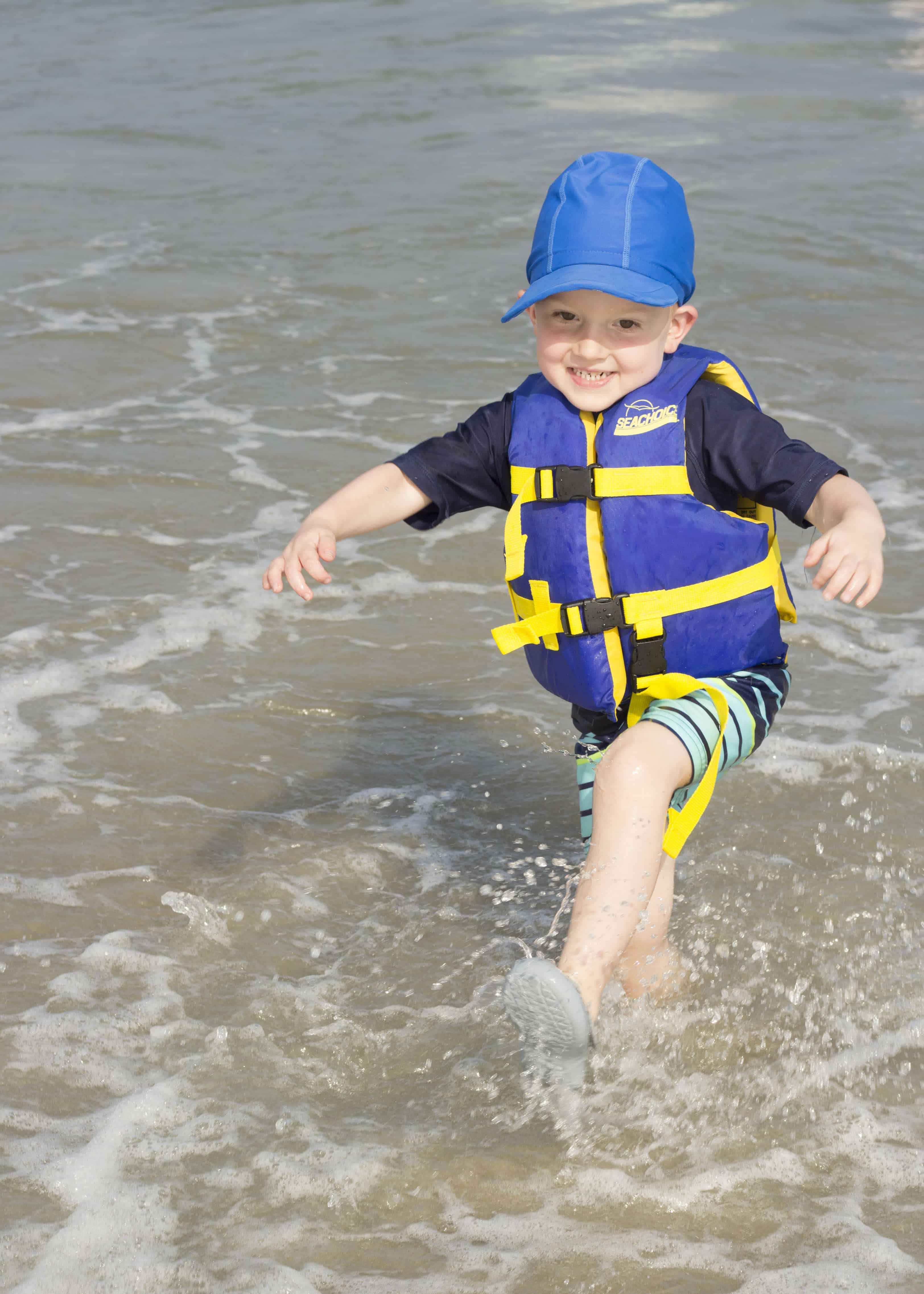 TODDLER ON BEACH