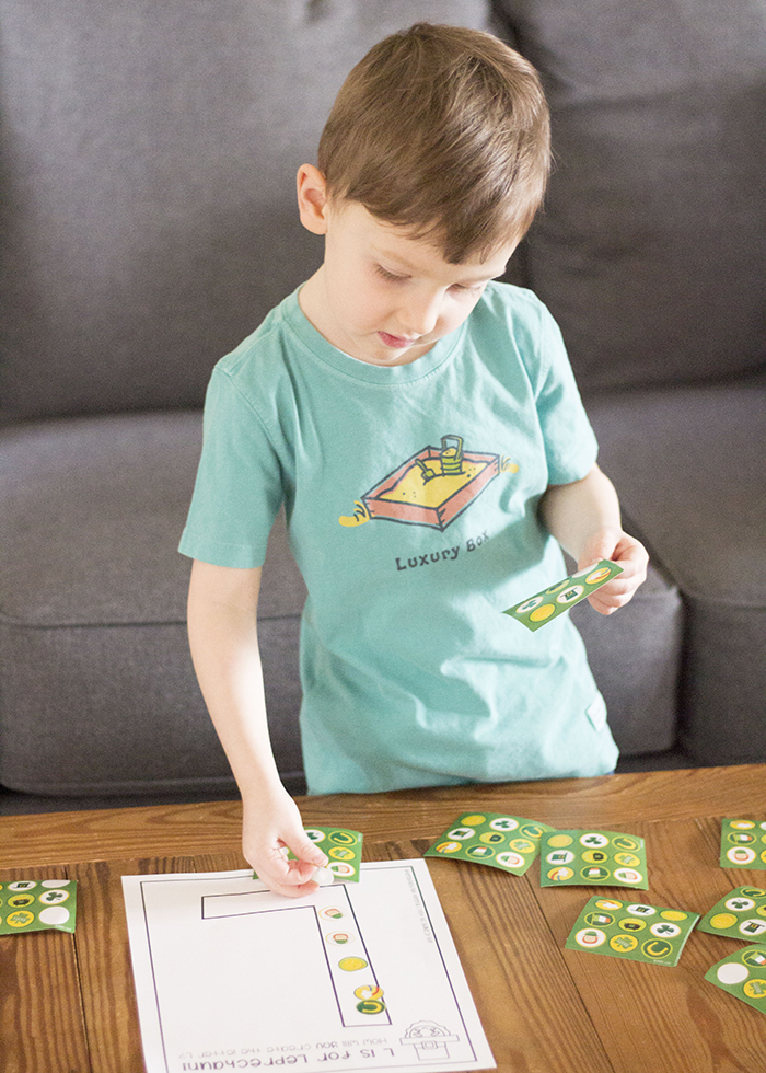 BOY PLACING STICKERS